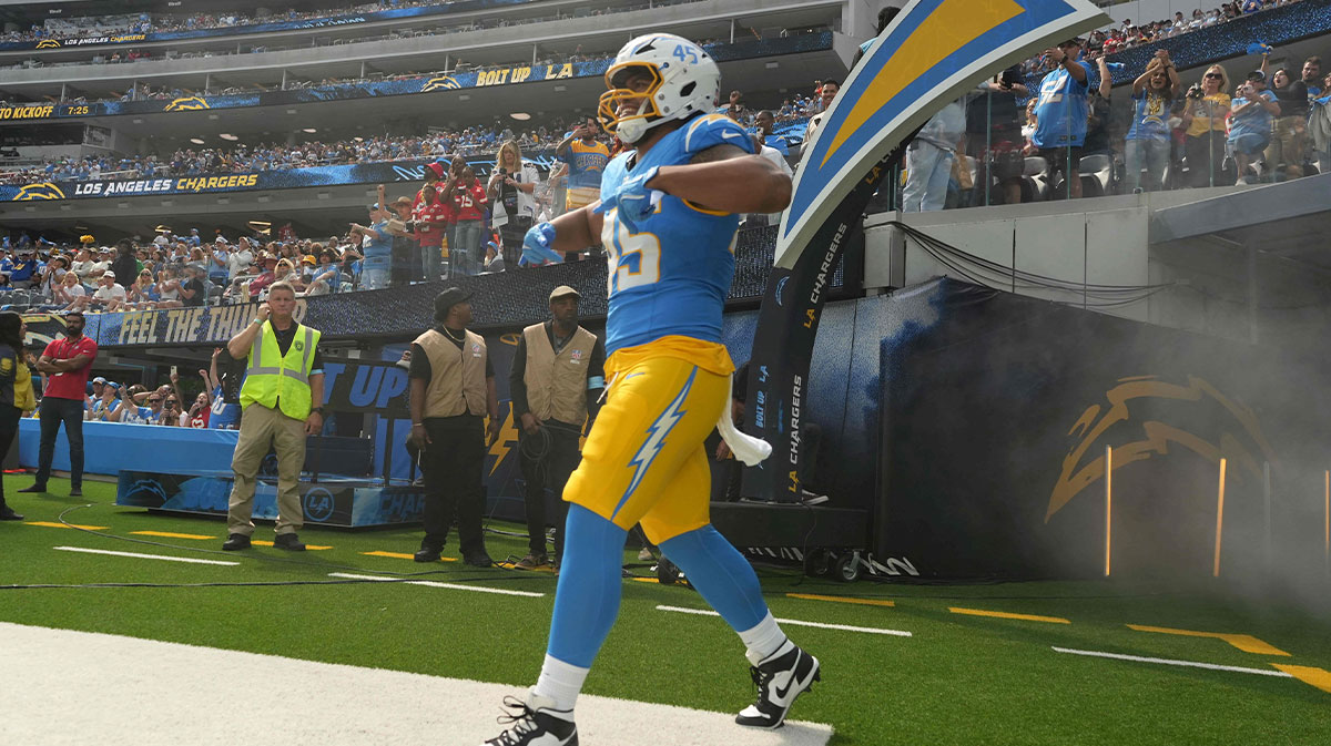 Los Angeles Chargers linebacker Tuli Tuipulotu (45) enters the field before the game against the Kansas City Chiefs at SoFi Stadium.