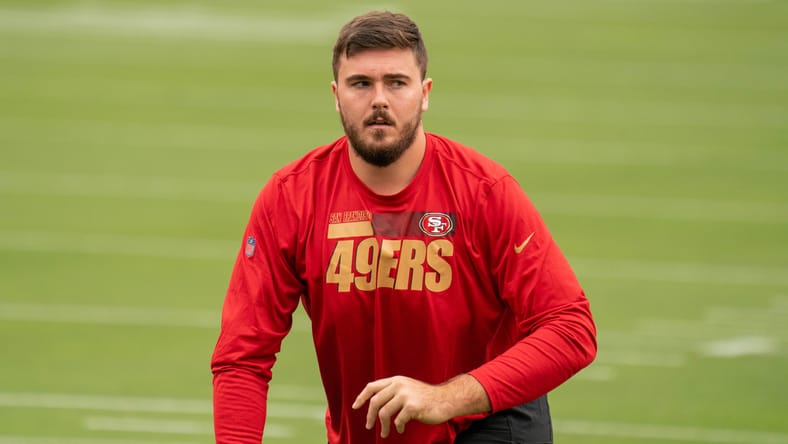 Justin Skule stands on the field before a game against the Arizona Cardinals. vikings players in limbo 2026