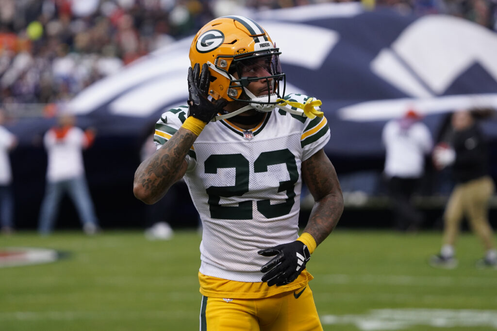 Green Bay Packers cornerback Jaire Alexander (23) gestures to the fans before the game against the Chicago Bears at Soldier Field.