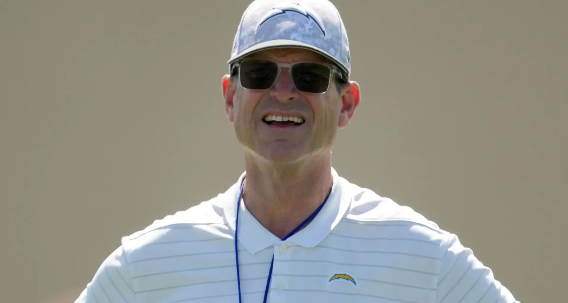 Jim Harbaugh faces scrutiny as Chargers stay quiet in offseason despite playoff hopes
