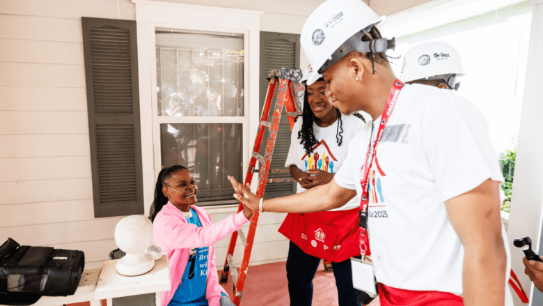 The Atlanta Falcons kick-started this year's HBCU Fellows Program by having the students participate in Atlanta Habitat for Humanity’s “A Brush with Kindness” project