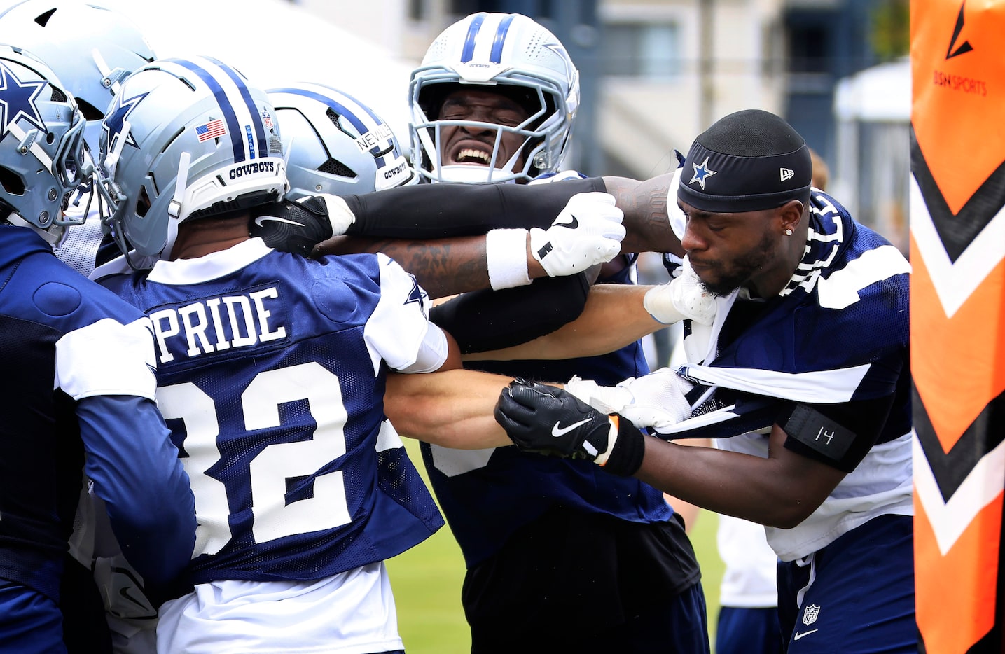 Dallas Cowboys safety Markquese Bell (right) lands a punch to the neck of teammate Troy...