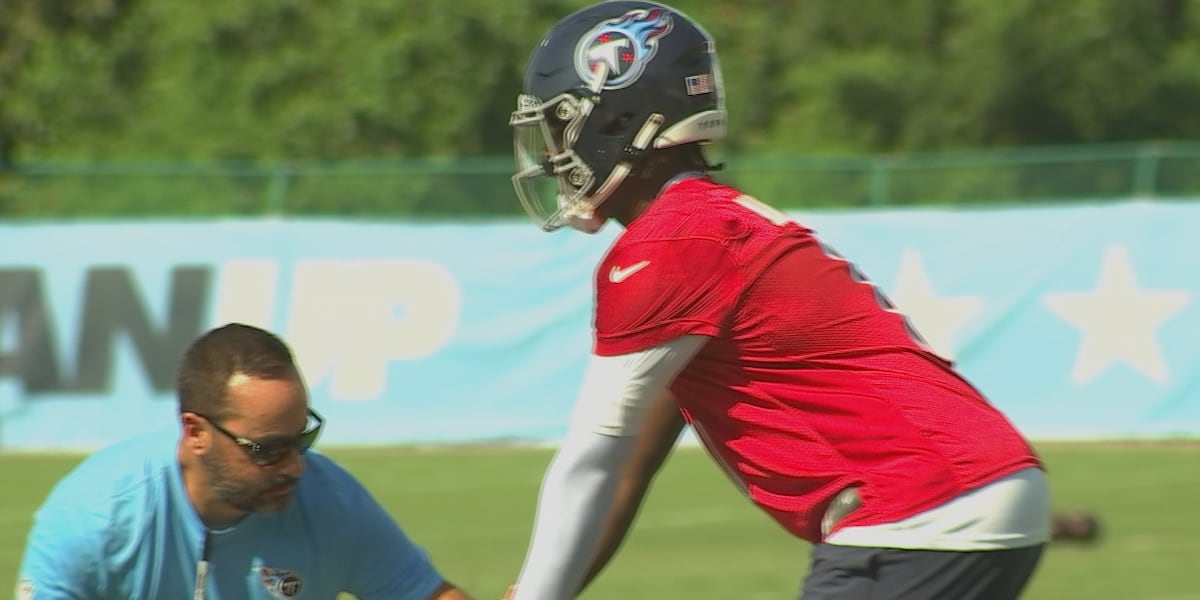 New-look Titans open training camp on steamy July morning