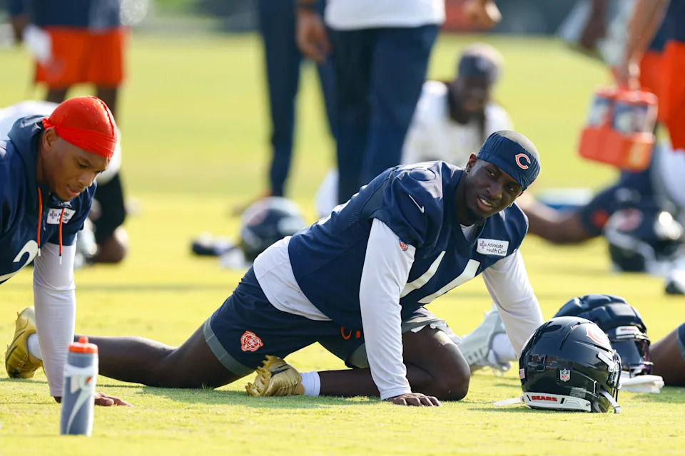 Jul 23, 2025; Lake Forest, IL, USA; Chicago Bears wide receiver Olamide Zaccheaus (14) warms up during training camp at Halas Hall. Mandatory Credit: Kamil Krzaczynski-Imagn Images