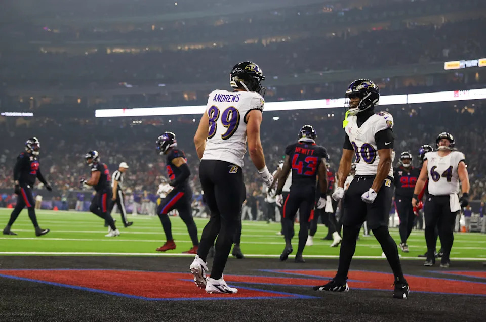 Dec 25, 2024; Houston, Texas, USA; Baltimore Ravens tight end Isaiah Likely (80) celebrates tight end Mark Andrews (89) touchdown reception against the Houston Texans in the second half at NRG Stadium. Mandatory Credit: Thomas Shea-Imagn Images