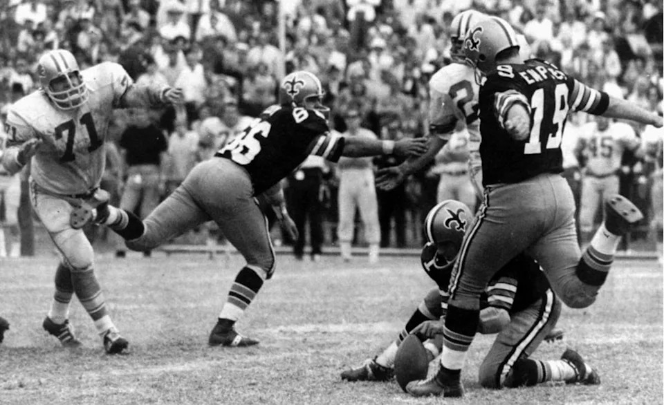 New Orleans Saints linebacker Bill Cody (66) blocks for a record 63-yard field goal by Tom Dempsey (19) against the Detroit Lions in 1970. Credit: AL.com