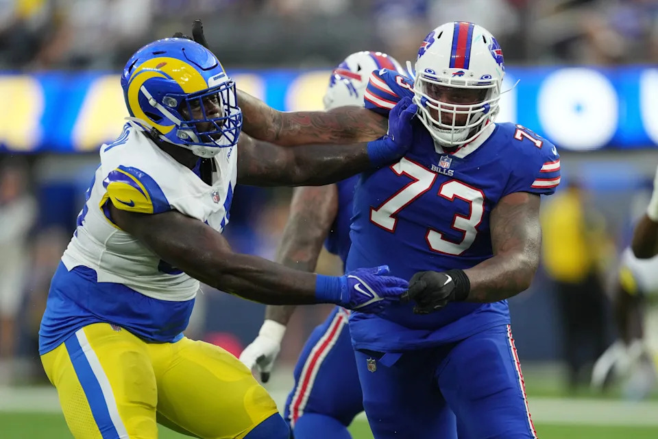 Sep 8, 2022; Inglewood, California, USA; Los Angeles Rams linebacker Leonard Floyd (54) defends against Buffalo Bills offensive tackle Dion Dawkins (73) in the second quarter at SoFi Stadium. Mandatory Credit: Kirby Lee-USA TODAY Sports