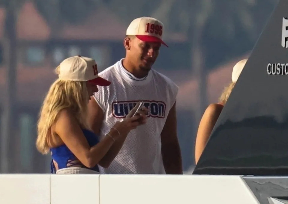 The NFL WAG matched her husband in a blue one-piece swimsuit. BACKGRID