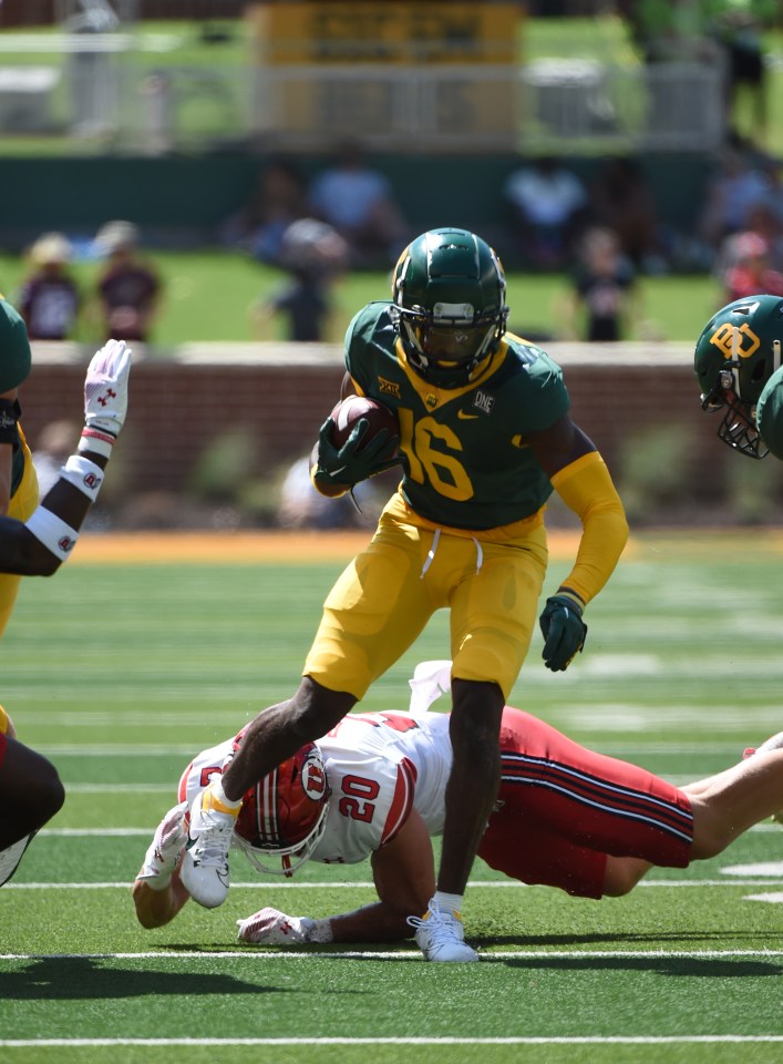 Baylor Bears wide receiver Hal Presley (16) running with the football during a college football game.