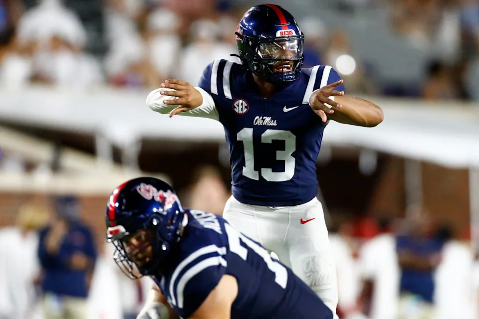 Ole Miss Rebels quarterback Austin Simmons (13) gives direction.© Petre Thomas-Imagn Images