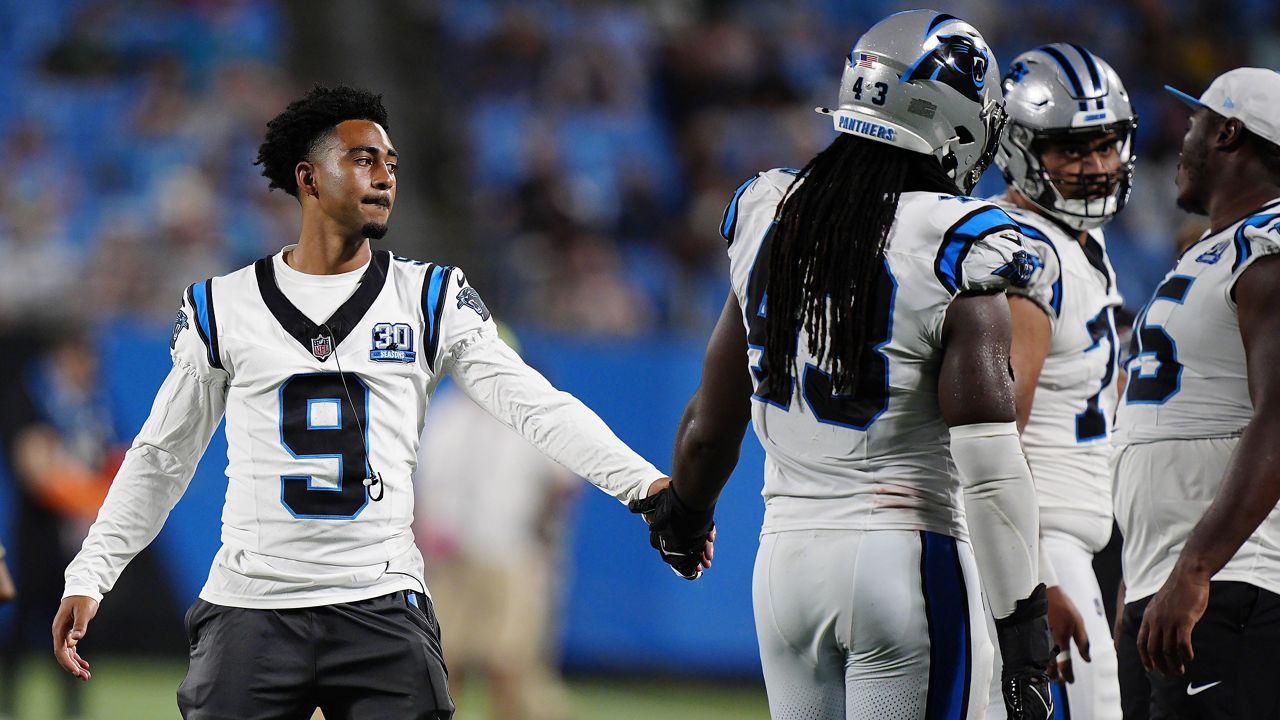 Carolina Panthers quarterback Bryce Young (9) greets teammates during a preseason game against the New York Jets, Saturday, Aug. 17, 2024, in Charlotte, N.C. (AP File Photo/Jacob Kupferman)