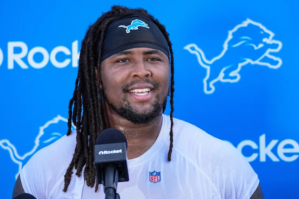 Detroit Lions defensive tackle Tyleik Williams (91) speaks to media members after practice during training camp at Meijer Performance Center in Allen Park on Thursday, July 24, 2025.