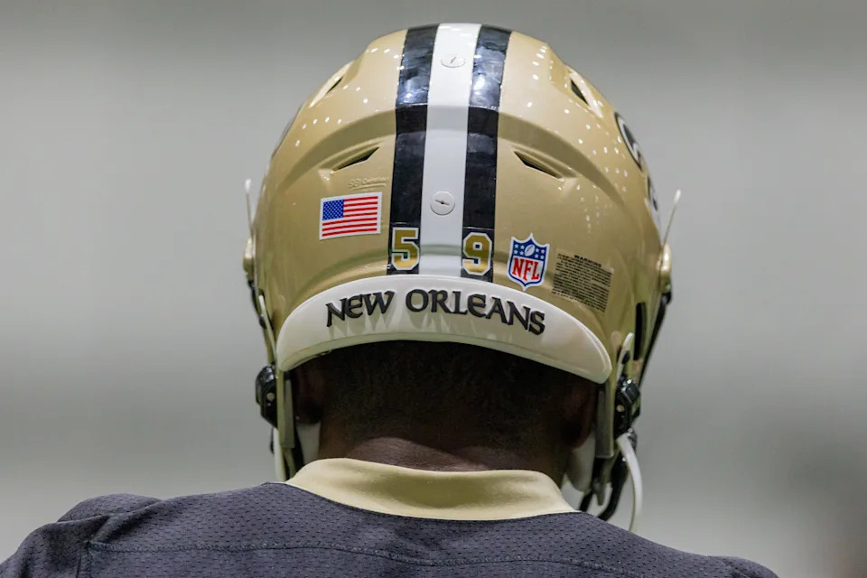May 10, 2025; New Orleans, LA, USA; Detailed view of the New Orleans Saints helmet during rookie minicamp at Ochsner Sports Performance Center. Mandatory Credit: Stephen Lew-Imagn Images