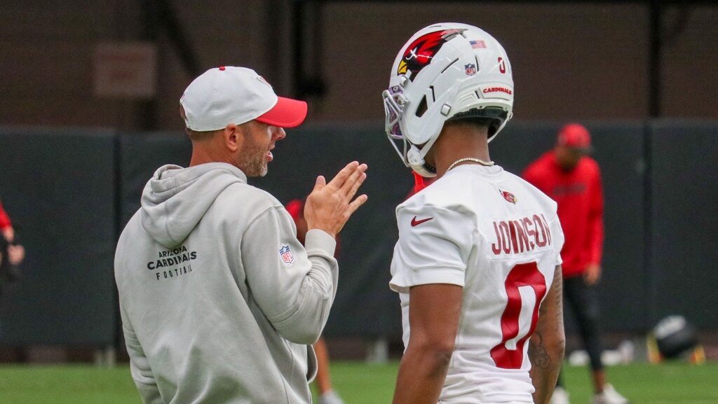 Will Johnson and Jonathan Gannon talk during Cardinals training camp...
