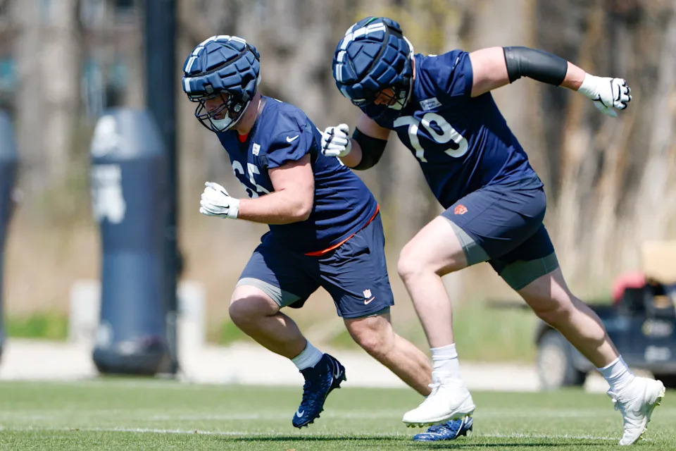 May 9, 2025; Lake Forest, IL, USA; Chicago Bears offensive line Luke Newman (65) and Theo Benedet (79) run during the Rookie Minicamp at Halas Hall. Mandatory Credit: Kamil Krzaczynski-Imagn Images