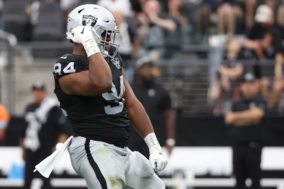 A source told ESPN that the defensive tackle had intended the incident, which took place inside a team meeting room, to be ‘playful’ but that the recipient of the kiss had taken offense and reported it to HR (Getty Images)