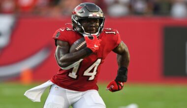 Tampa Bay Buccaneers wide receiver Chris Godwin (14) runs with the ball after a catch against the Buffalo Bills during the first half of an NFL football game Sunday, Dec. 12, 2021, in Tampa, Fla. (AP Photo/Jason Behnken)