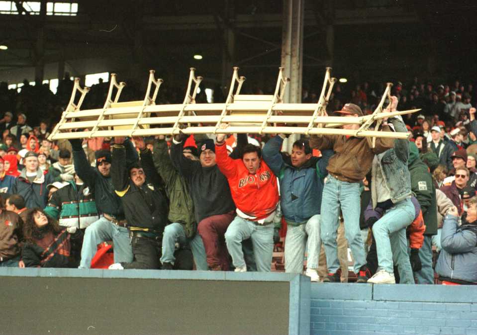 Browns fans thew rows of seats onto the field