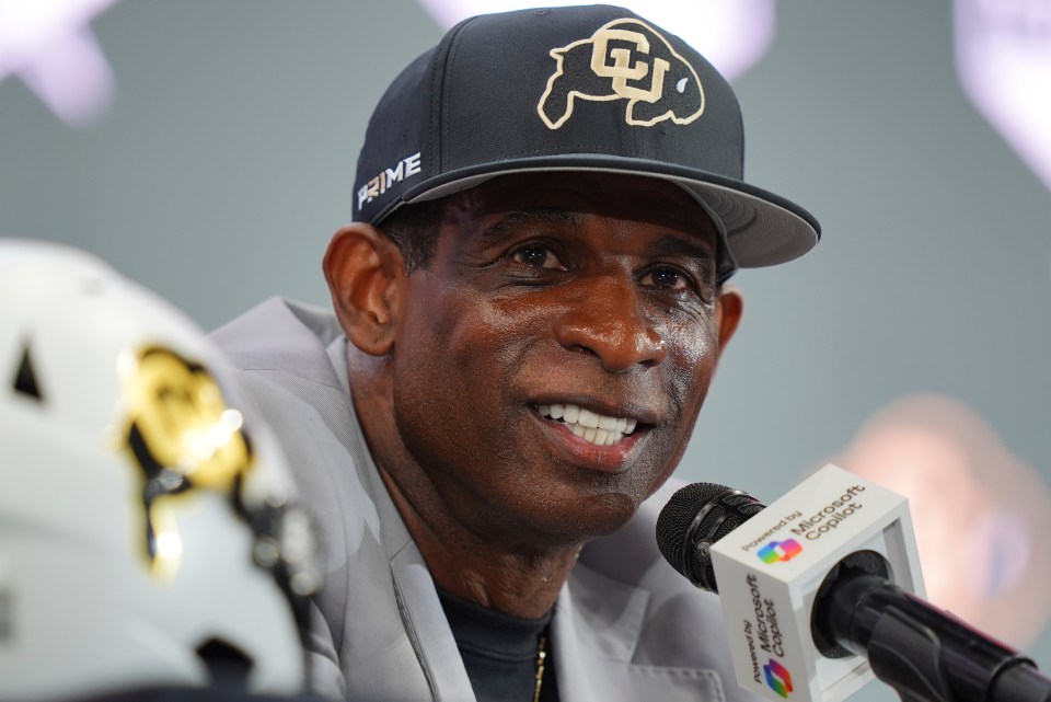 Deion Sanders at a press conference.