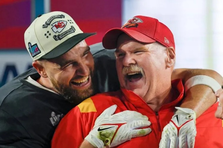 Kansas City Chiefs tight end Travis Kelce (87) hugs Chiefs Head Coach Andy Reid as Tammy Reid looks on after the Chiefs won Super Bowl LVII, defeating the the Philadelphia Eagles, 38-35, on Sunday, Feb. 12, 2023, at State Farm Stadium in Glendale, Arizona. (Tammy Ljungblad/Kansas City Star/Tribune News Service via Getty Images)