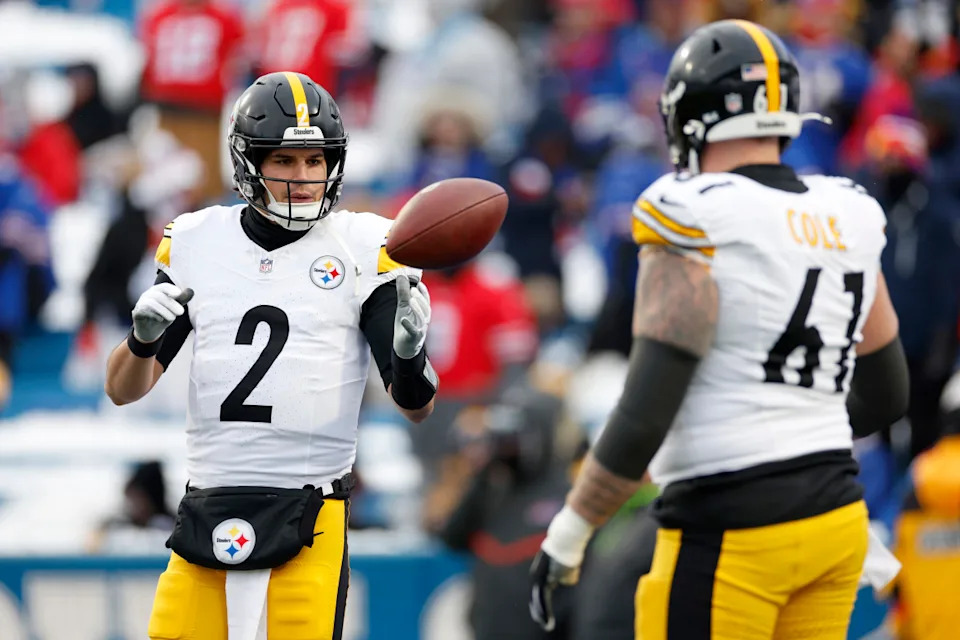 ORCHARD PARK, NEW YORK - JANUARY 15: Mason Rudolph #2 of the Pittsburgh Steelers warms up with Mason Cole #61 before the game against the Buffalo Bills at Highmark Stadium on January 15, 2024 in Orchard Park, New York. (Photo by Sarah Stier/Getty Images)Sarah Stier&sol;Getty Images
