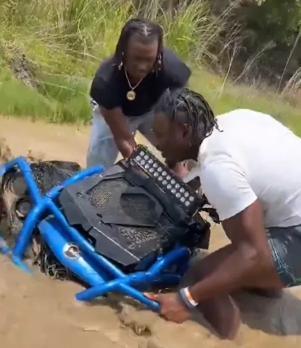 Panthers receiver Xavier Legette helps a man get his ATV out of the mud. @NFL_DovKleiman/X