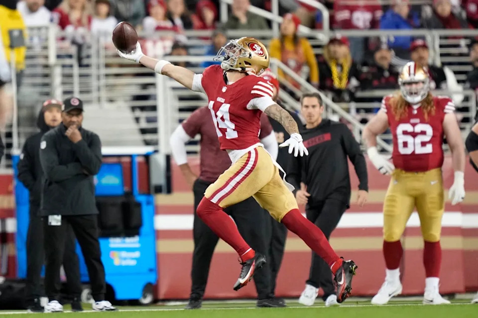 San Francisco 49ers wide receiver Ricky Pearsall (14) catches the football against the Detroit Lions during the first quarter at Levi's Stadium.Kyle Terada-Imagn Images