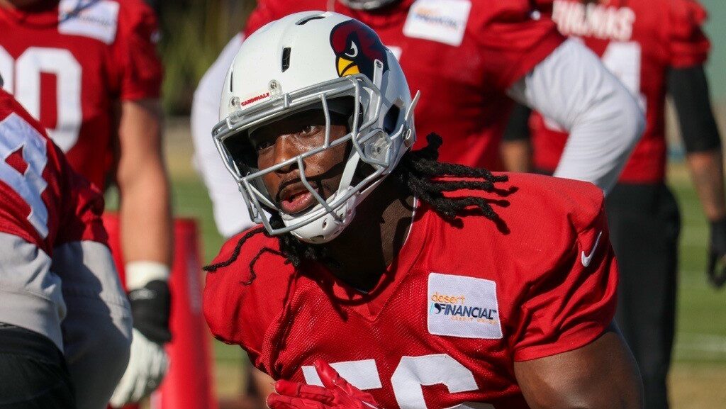 Darius Robinson runs through drills during Cardinals practice...