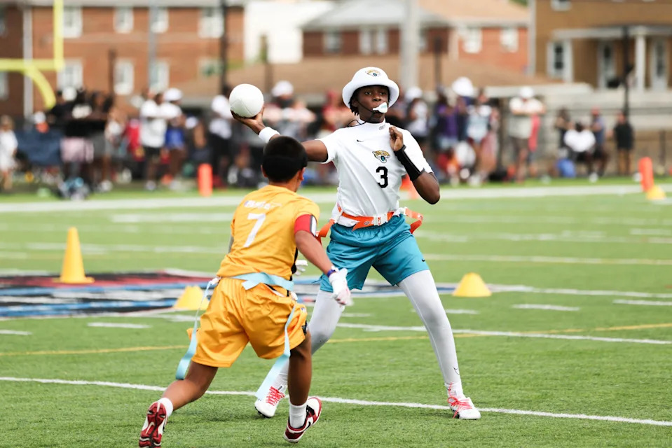Jaiden Barnett of the Jaguars Elite 14U flag football team finds an open receiver on July 18 in Canton, Ohio during a game in the NFL Flag Championship.
