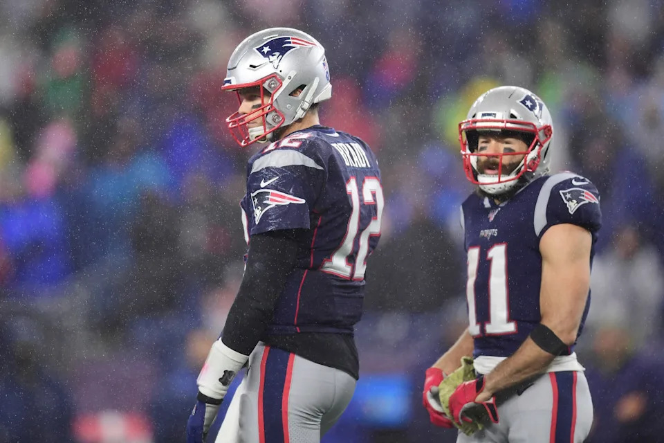 FOXBOROUGH, MASSACHUSETTS - NOVEMBER 24: Tom Brady #12 and Julian Edelman #11 of the New England Patriots reacts during the second half against the Dallas Cowboys in the game at Gillette Stadium on November 24, 2019 in Foxborough, Massachusetts. (Photo by Billie Weiss/Getty Images)Billie Weiss&sol;Getty Images