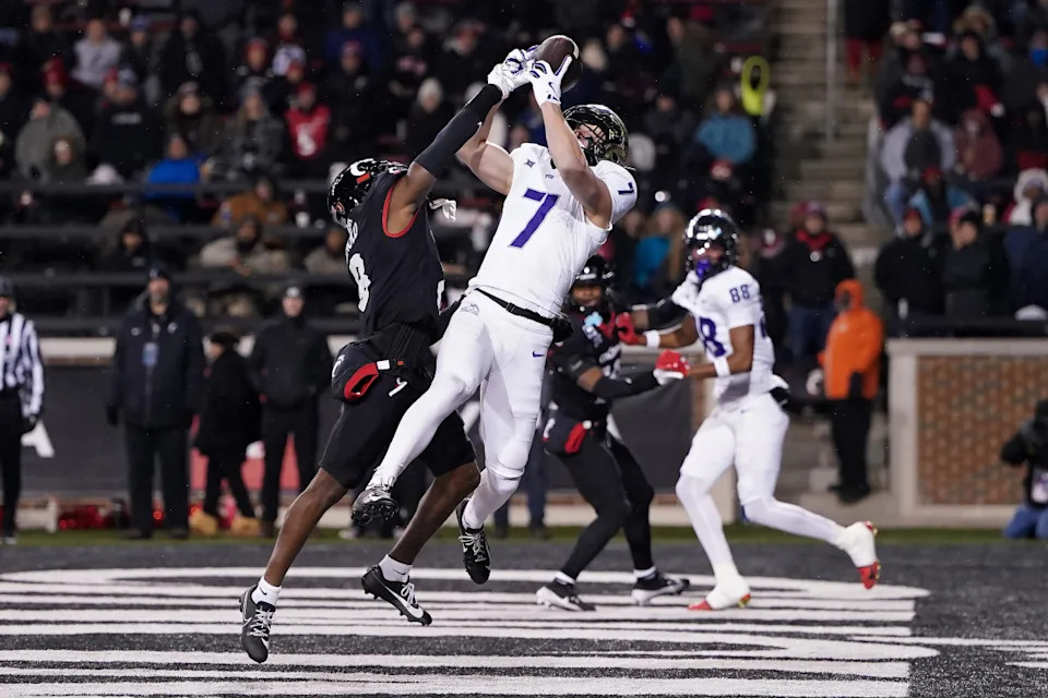 CINCINNATI, OHIO - NOVEMBER 30: Ormanie Arnold #8 of the Cincinnati Bearcats breaks up a pass intended for JP Richardson #7 of the TCU Horned Frogs in the second quarter at Nippert Stadium on November 30, 2024 in Cincinnati, Ohio. (Photo by Dylan Buell/Getty Images)