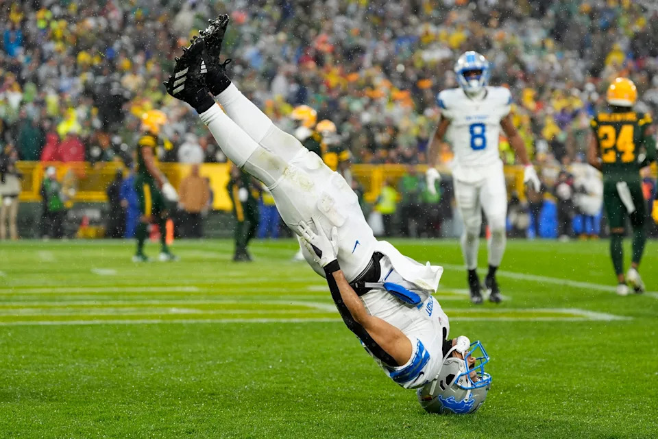 Detroit Lions wide receiver Amon-Ra St. Brown (14) celebrates a touchdown against Green Bay Packers during the first half at Lambeau Field in Green Bay, Wis. on Sunday, Nov. 3, 2024.