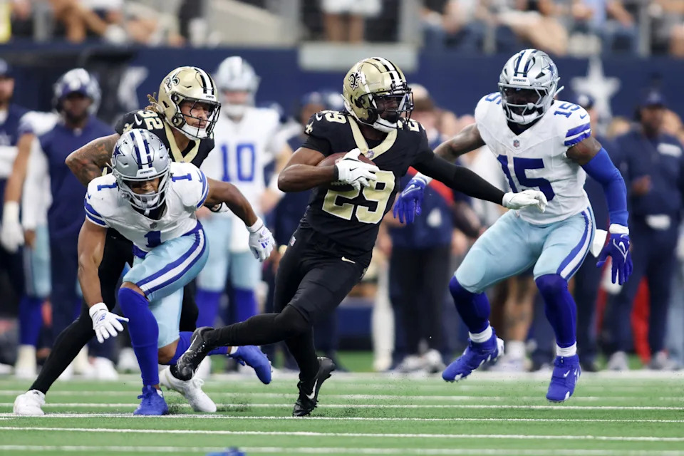 Sep 15, 2024; Arlington, Texas, USA; New Orleans Saints cornerback Paulson Adebo (29) returns an interception against the Dallas Cowboys in the second quarter at AT&T Stadium. Mandatory Credit: Tim Heitman-Imagn Images