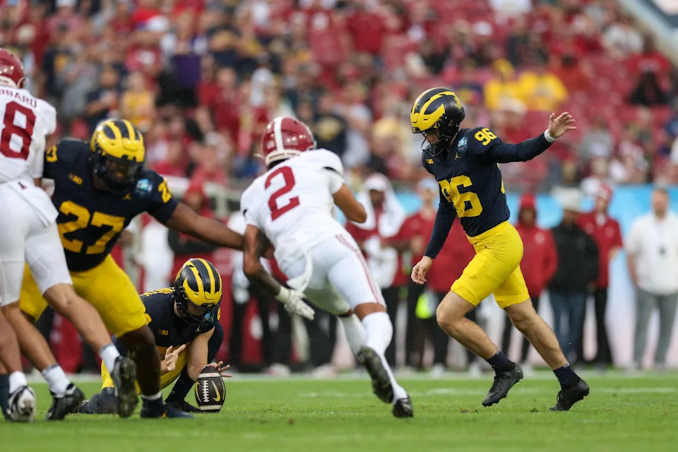 Dominic Zvada kicks during the ReliaQuest Bowl vs. Alabama. © Nathan Ray Seebeck-Imagn Images