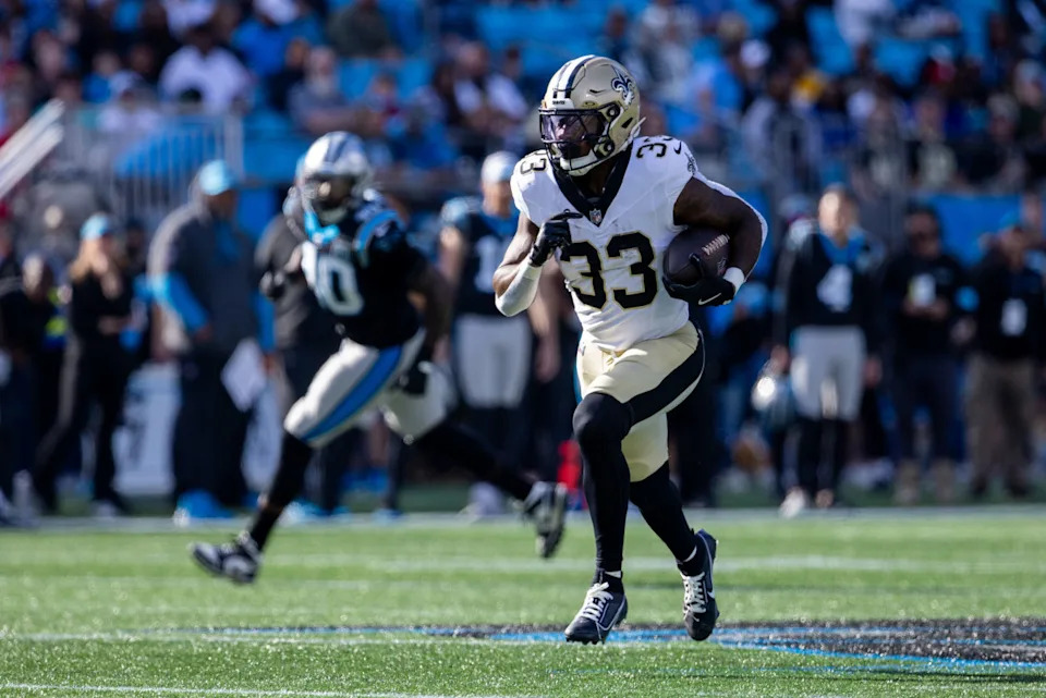 Nov 3, 2024; Charlotte, North Carolina, USA; New Orleans Saints running back Jordan Mims runs with the ball against the Carolina Panthers during the third quarter at Bank of America Stadium. Mandatory Credit: Scott Kinser-Imagn Images