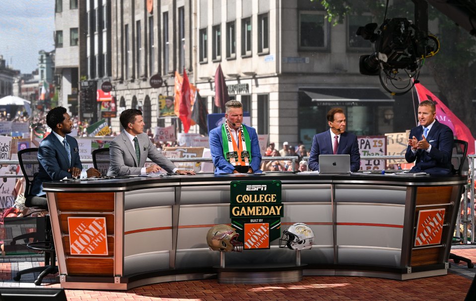 ESPN College GameDay hosts and analysts at a pre-match event.