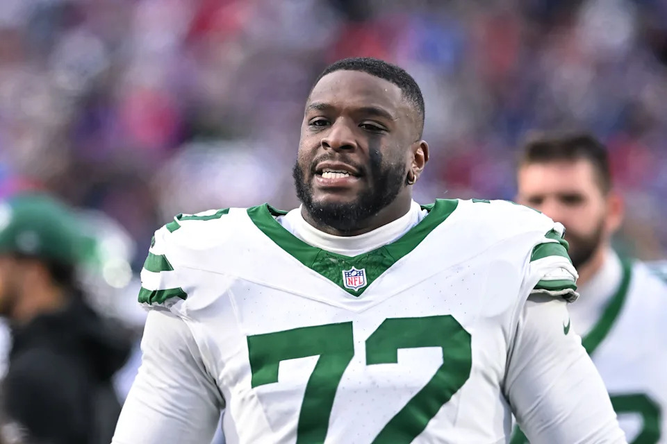 Dec 29, 2024; Orchard Park, New York, USA; New York Jets defensive end Micheal Clemons (72) on the sideline in the fourth quarter game against the Buffalo Bills at Highmark Stadium. Mandatory Credit: Mark Konezny-Imagn Images
