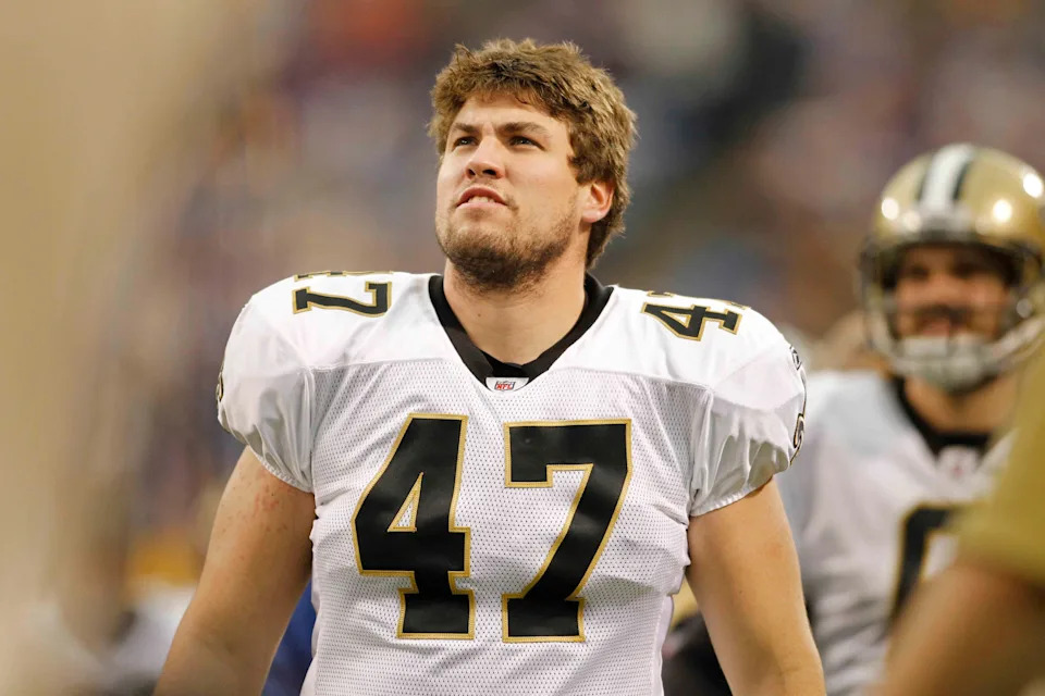 Dec 18, 2011; Minneapolis, MN, USA; New Orleans long snapper Justin Drescher (47) looks up along the sidelines during the game with the Minnesota Vikings at the Metrodome. The Saints win 42-20. Mandatory Credit: Bruce Kluckhohn-USA TODAY Sports