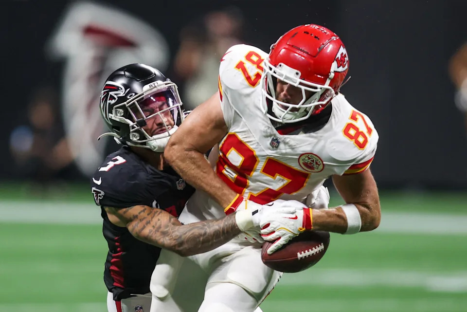 Atlanta Falcons safety Jessie Bates III (3) breaks up a pass intended for Kansas City Chiefs tight end Travis Kelce (87).Brett Davis-Imagn Images