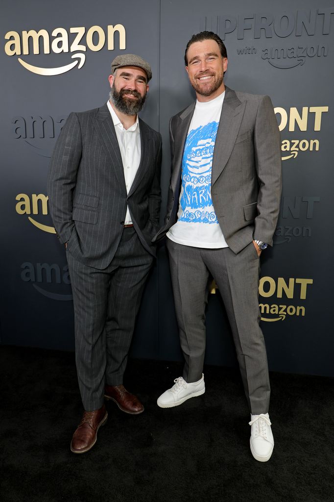 jason kelce and travis kelce wearing suits at amazon 2025 upfront