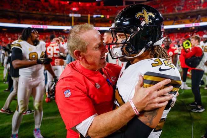 KANSAS CITY, MISSOURI - OCTOBER 7: Steve Spagnuolo, defensive coordinator of the Kansas City Chiefs greets former Chiefs player Tyrann Mathieu #32 of the New Orleans Saints following the 26-13 win by the Chiefs at GEHA Field at Arrowhead Stadium on October 7, 2024 in Kansas City, Missouri. (Photo by David Eulitt/Getty Images)