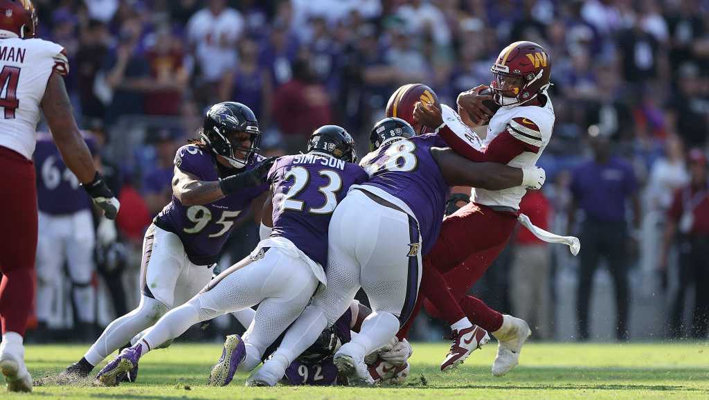 Ravens hold off Commanders 30-23 at home for fourth straight win