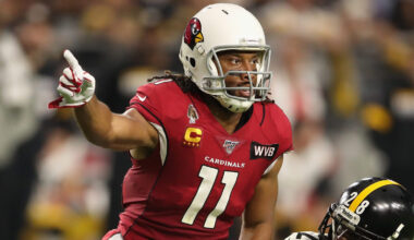 Cardinals wide receiver Larry Fitzgerald pointing for a first down. The 11-time Pro Bowler was left...