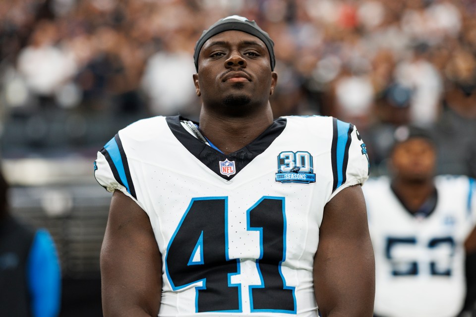 Tarron Jackson #41, Carolina Panthers linebacker, on the sidelines.
