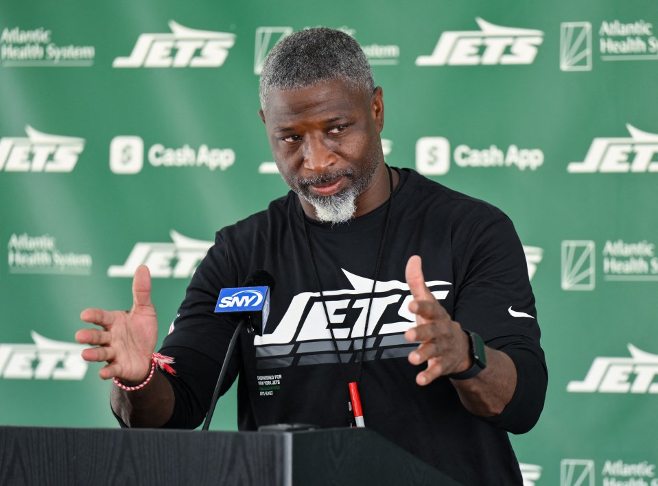 New York Jets head coach Aaron Glenn speaking at a press conference.