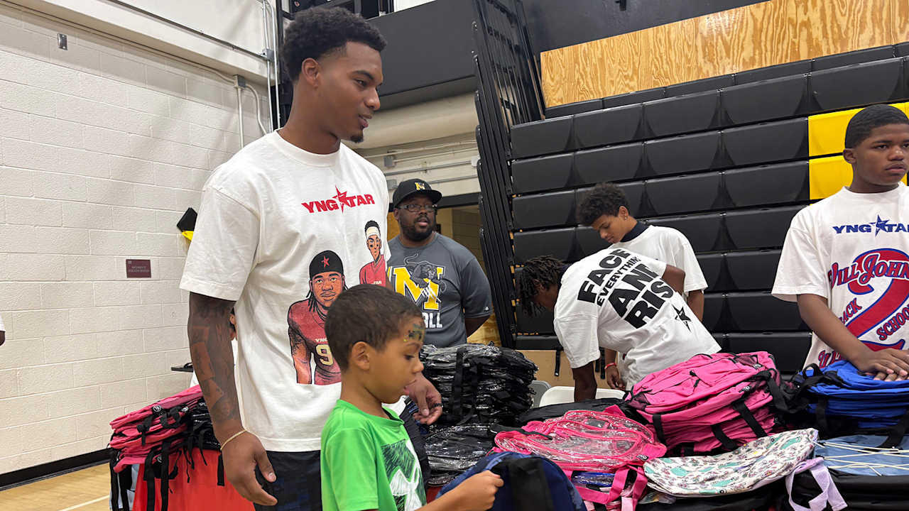 Cardinals rookie Walter Nolen III takes break from calf rehab to take part in fellow rookie Will Johnson's community event