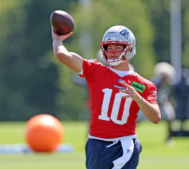 Foxboro, MA - July 23 - Quarterback Drake Maye (10) of the New England Patriots gets ready to throw during Training Camp at Gillette Stadium. (Photo By Matt Stone/Boston Herald)