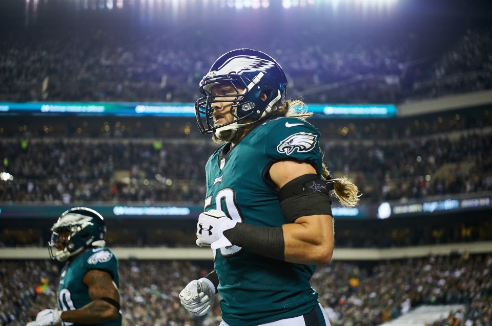 Philadelphia Eagles defensive back Bryan Braman (#50) jogging on the sidelines.