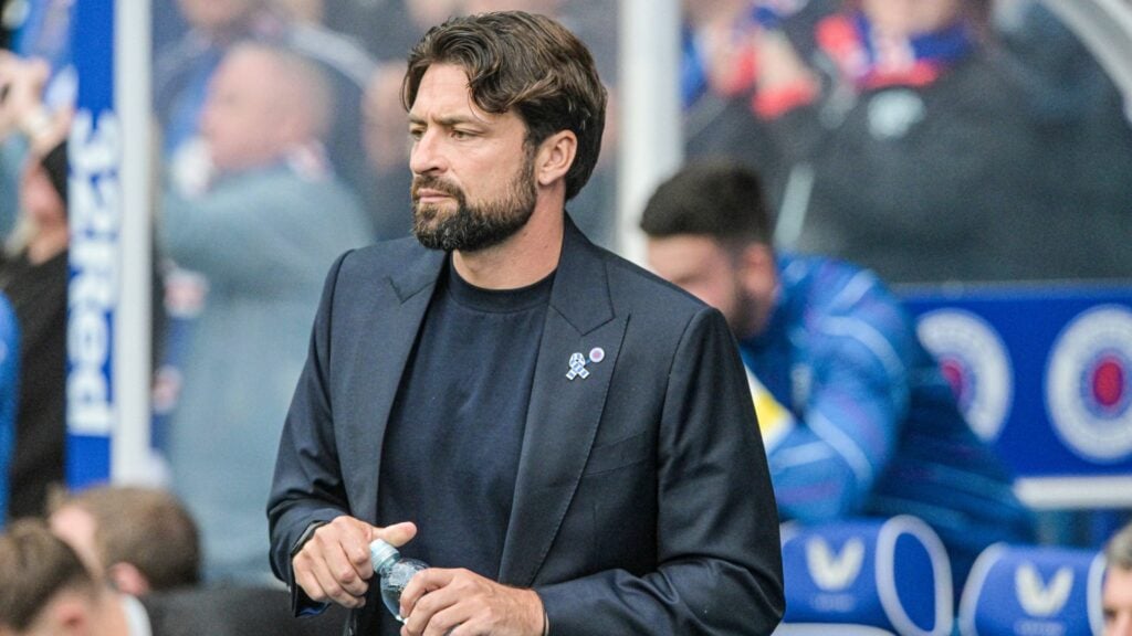 Russell Martin watching his Rangers side at Ibrox