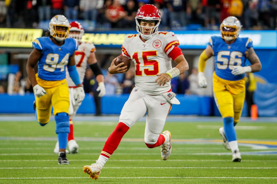 Patrick Mahomes scrambling for a first down.